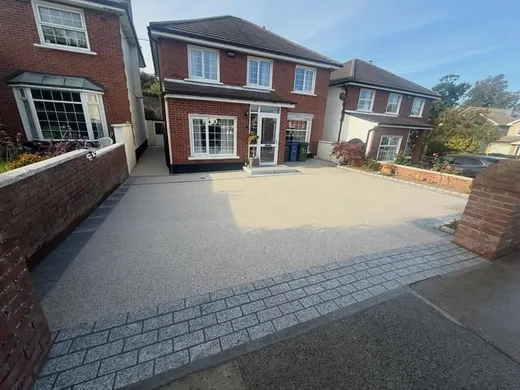 Ipanema Beach resin with a granite cobble entrance.