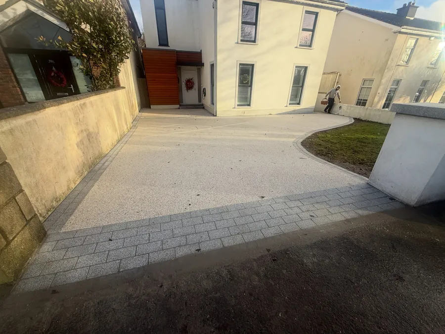 Ipanema Beach resin bound with granite detailing.