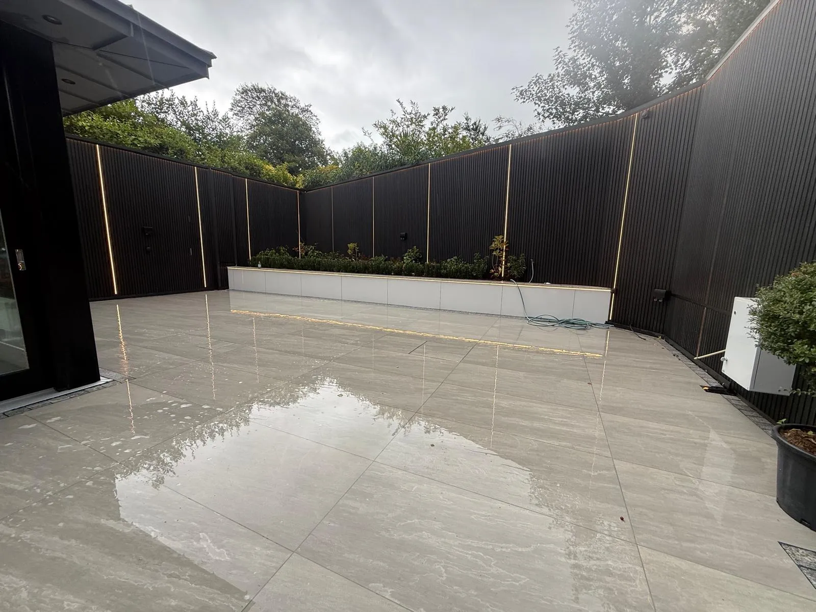 Porcelain & Natural Stone Patios by Design